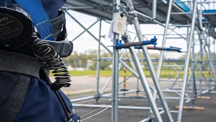Worker in a harness during technical work
